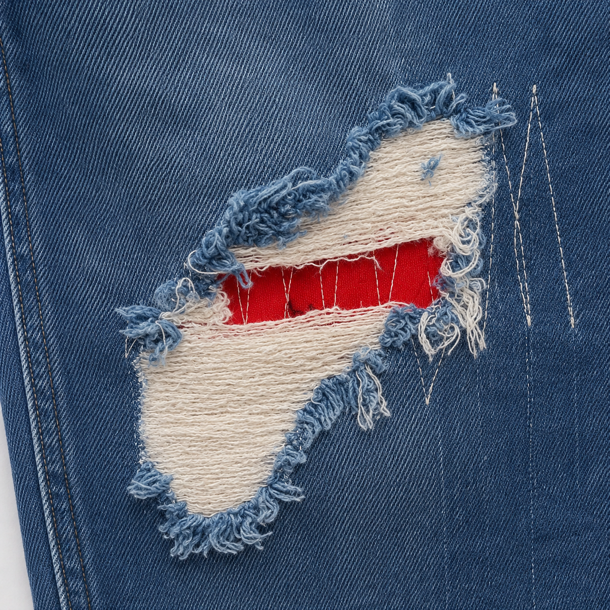 AMIRI Patch Distressed Jean